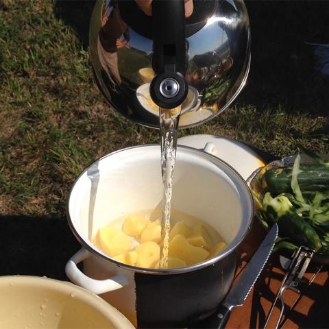 снимка на Dishes with a solar cooker