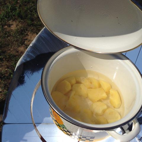 снимка на Dishes with a solar cooker