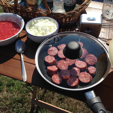 снимка на Dishes with a solar cooker