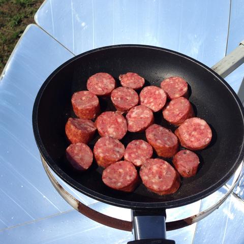 снимка на Dishes with a solar cooker
