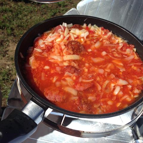 снимка на Dishes with a solar cooker